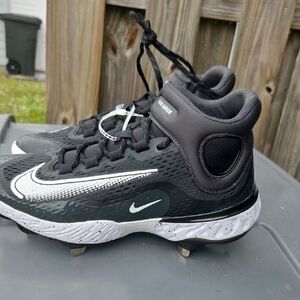 Nike Black and White High-Top Cleats